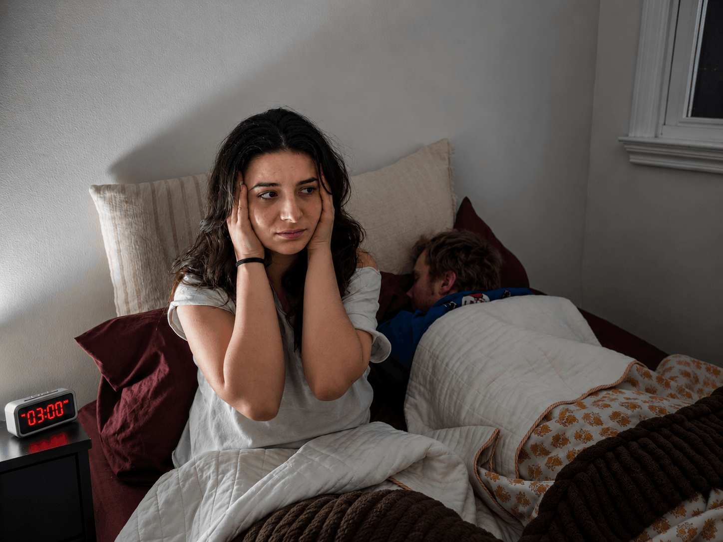 Lying awake at night, unable to sleep